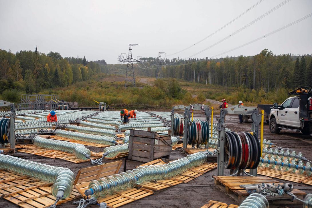 Transmission line insulator assembly takes place at a helicopter fly-yard. | September 2021