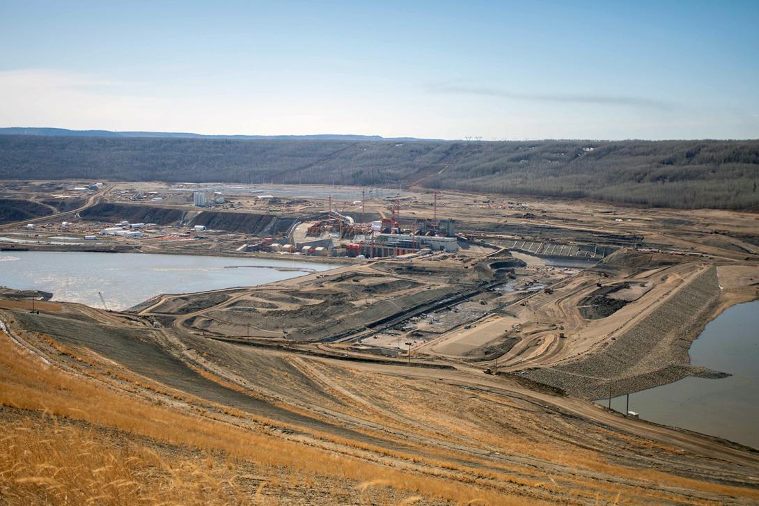 Panorama of site from the north bank showing the completed upstream and downstream cofferdams, ongoing foundation works and excavation of the dam core trench. | April 2021