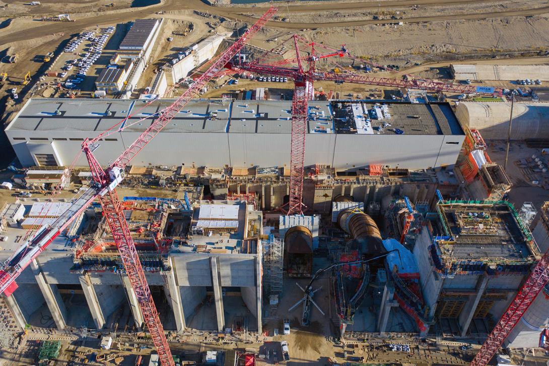 Aerial view of the intakes, penstocks and powerhouse. | October 2021