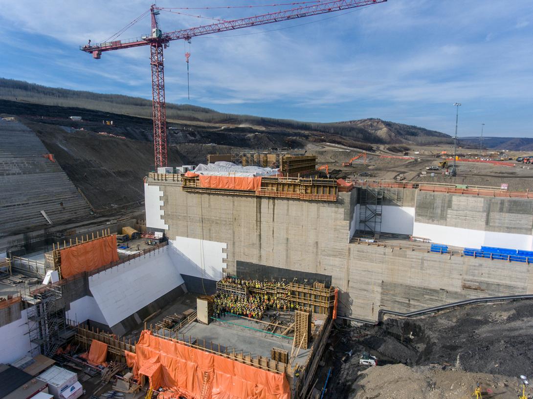 Generating station and spillways construction team standing in the future powerhouse (unit 1) | October 2018