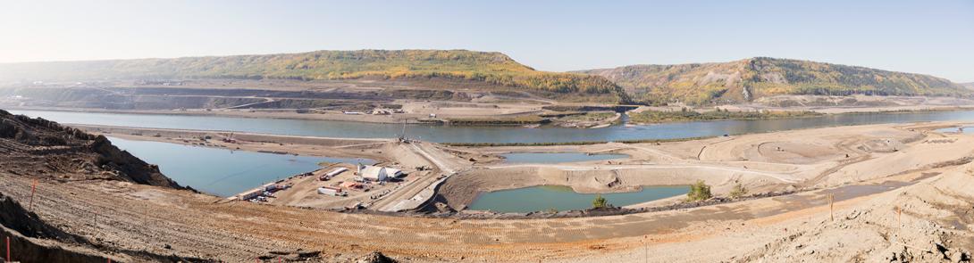 Aerial view of the inlet cofferdam, the south bank excavation, and Moberly River | September 2017