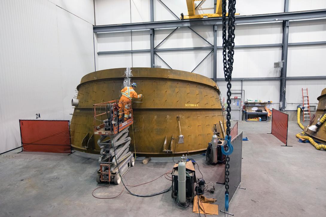 Turbines and generators contractor assembling equipment at their work area | November 2017