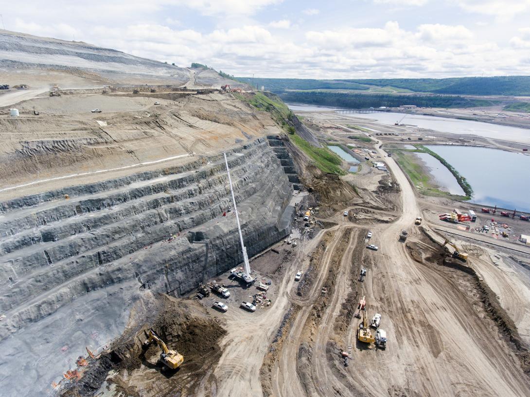 North bank excavation and shotcrete placement, looking downstream | June 2018