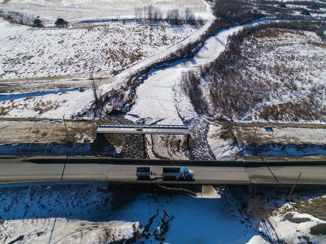 The Cache Creek temporary construction bridge at the Highway 29 realignment is in place. Bridge approaches will be completed in spring 2021. |February 2021