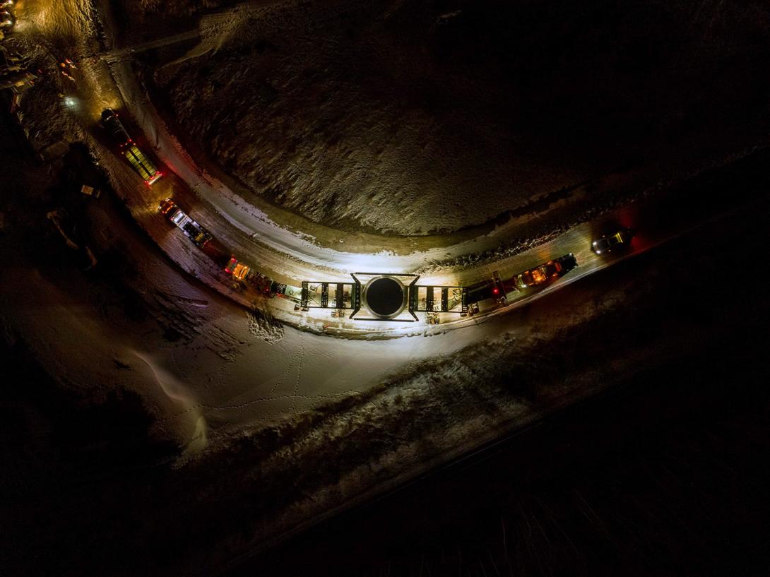 An aerial shot of turbine runner in transit on site. | January 2021