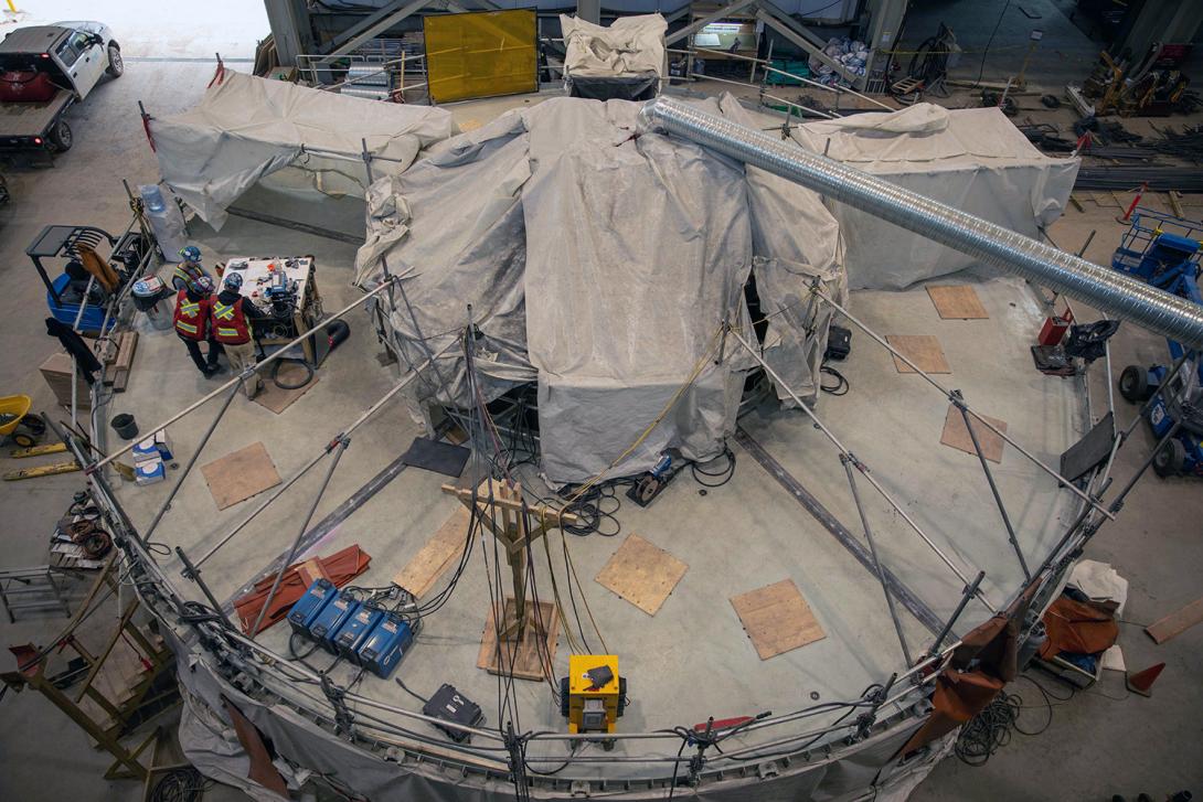 A rotor hub and spider welding in the main service bay of the powerhouse. | April 2022