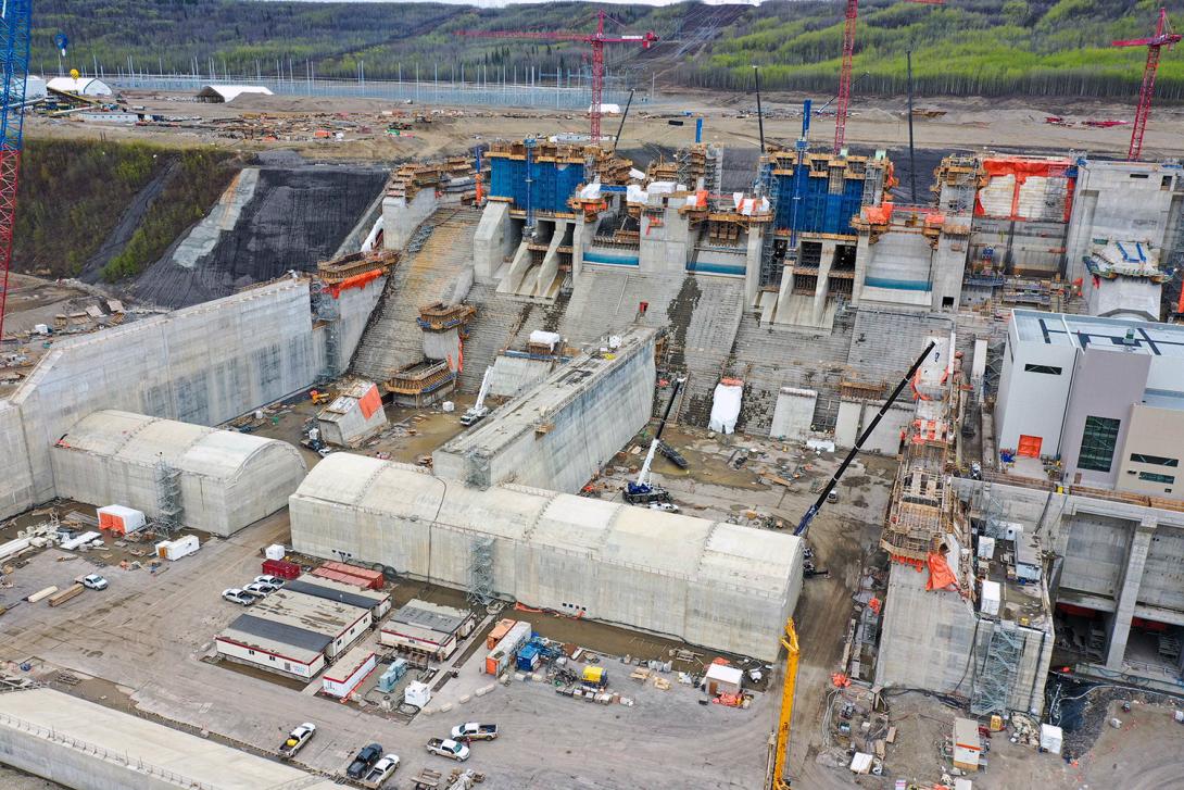 These large concrete blocks are the stilling basin weirs used to take the energy out of the falling water. | May 2022