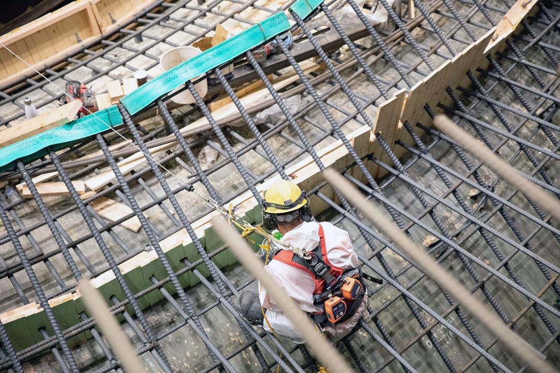 A worker prepares the Unit 3 spiral case for concrete placement. | September 2022