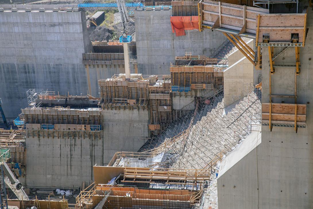 Spillway stilling basin divider wall, chute, and jet deflector. | July 2022