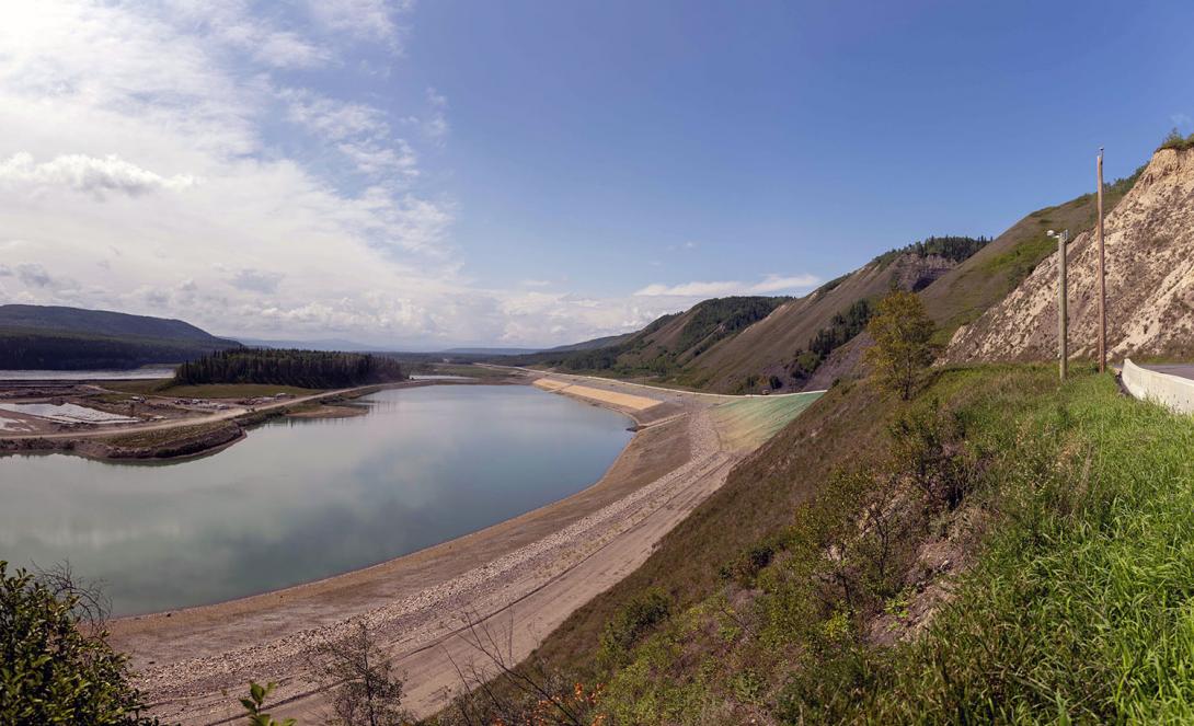 The highway realignment at Lynx Creek is complete. Shoreline armouring is in place in preparation for reservoir filling.