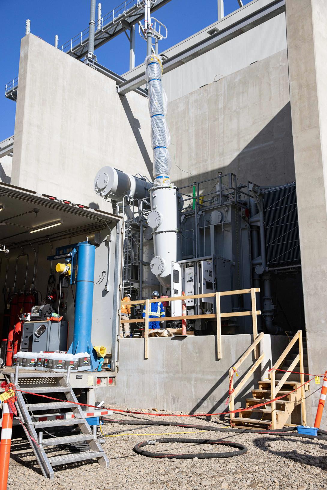 The first of nine transformers is being assembled in the transformer yard.